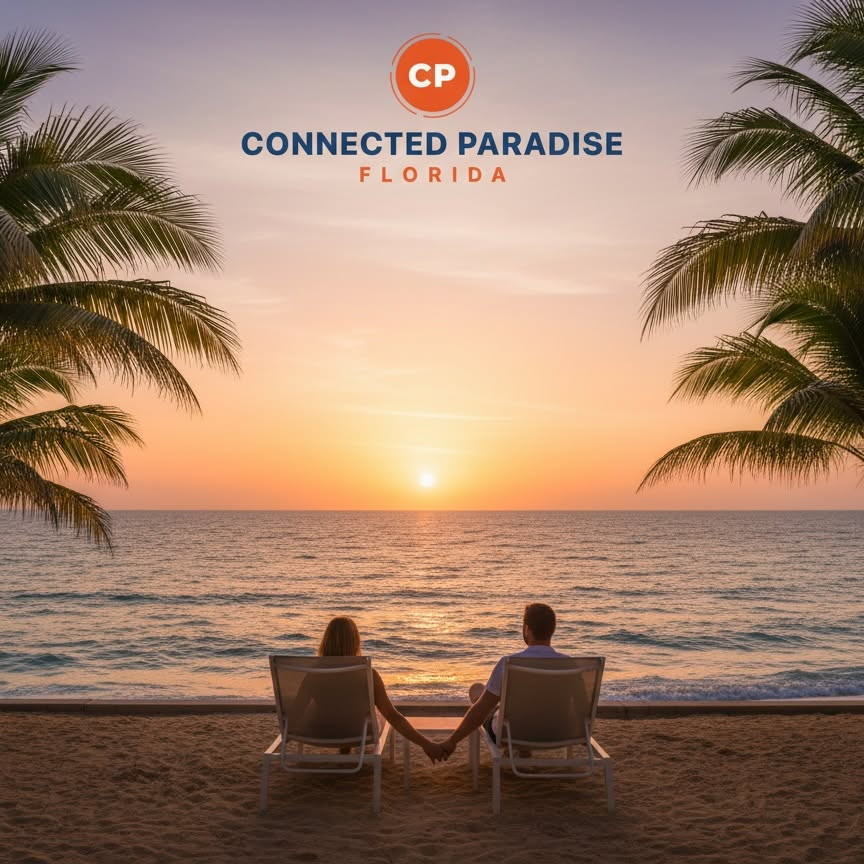 A couple holding hands on the beach at sunset